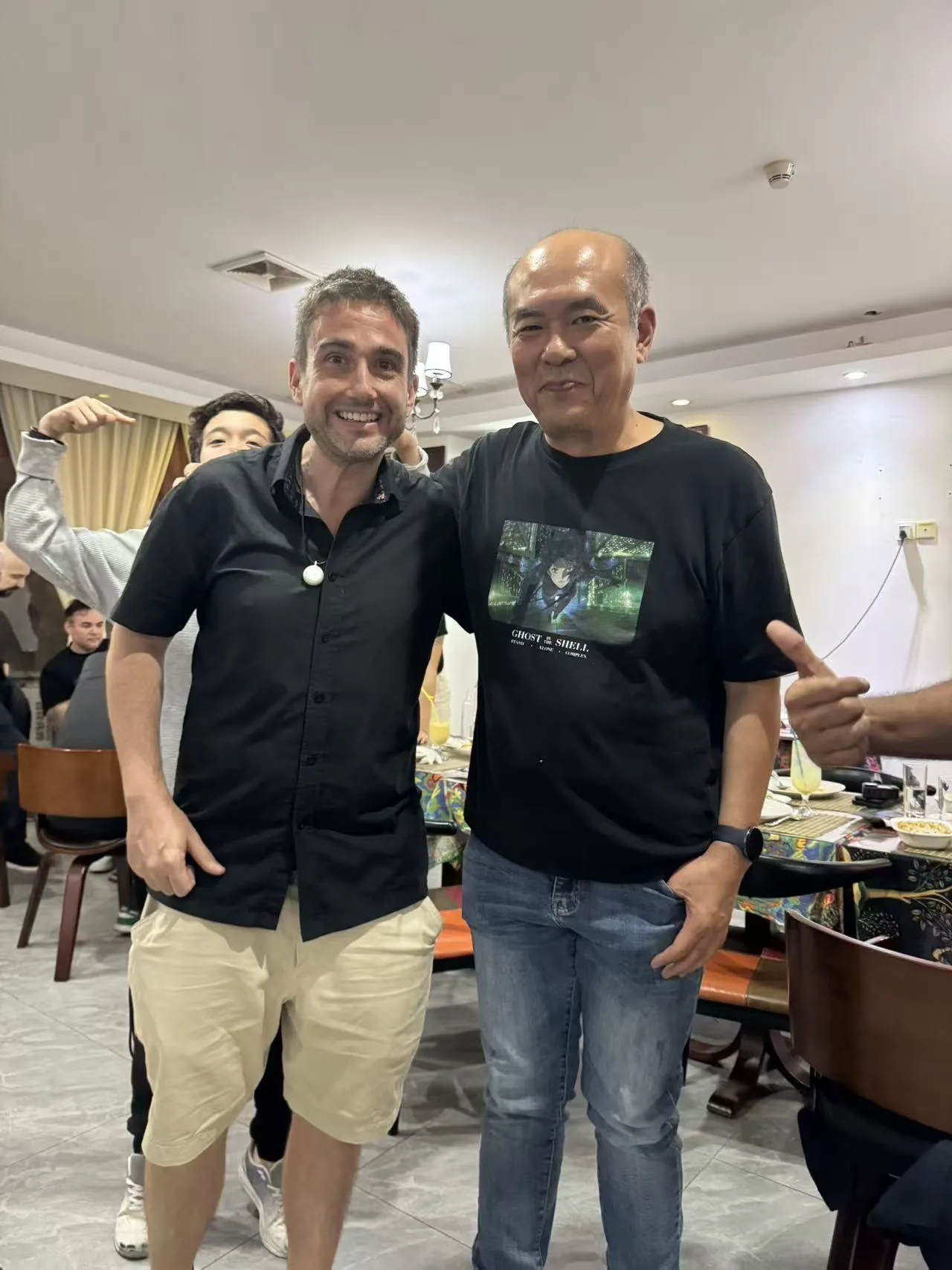 Two attendees posing together at the Shenzhen cross border dinner